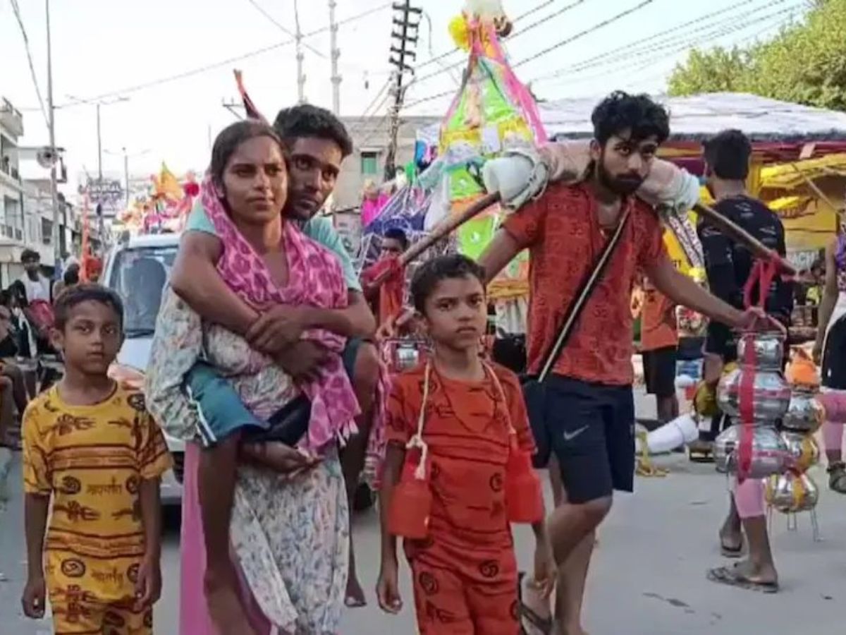 Asha Carries Paralyzed Husband On Shoulder For Kanwar Yatra(Image Credit-X) - Photo Gallery