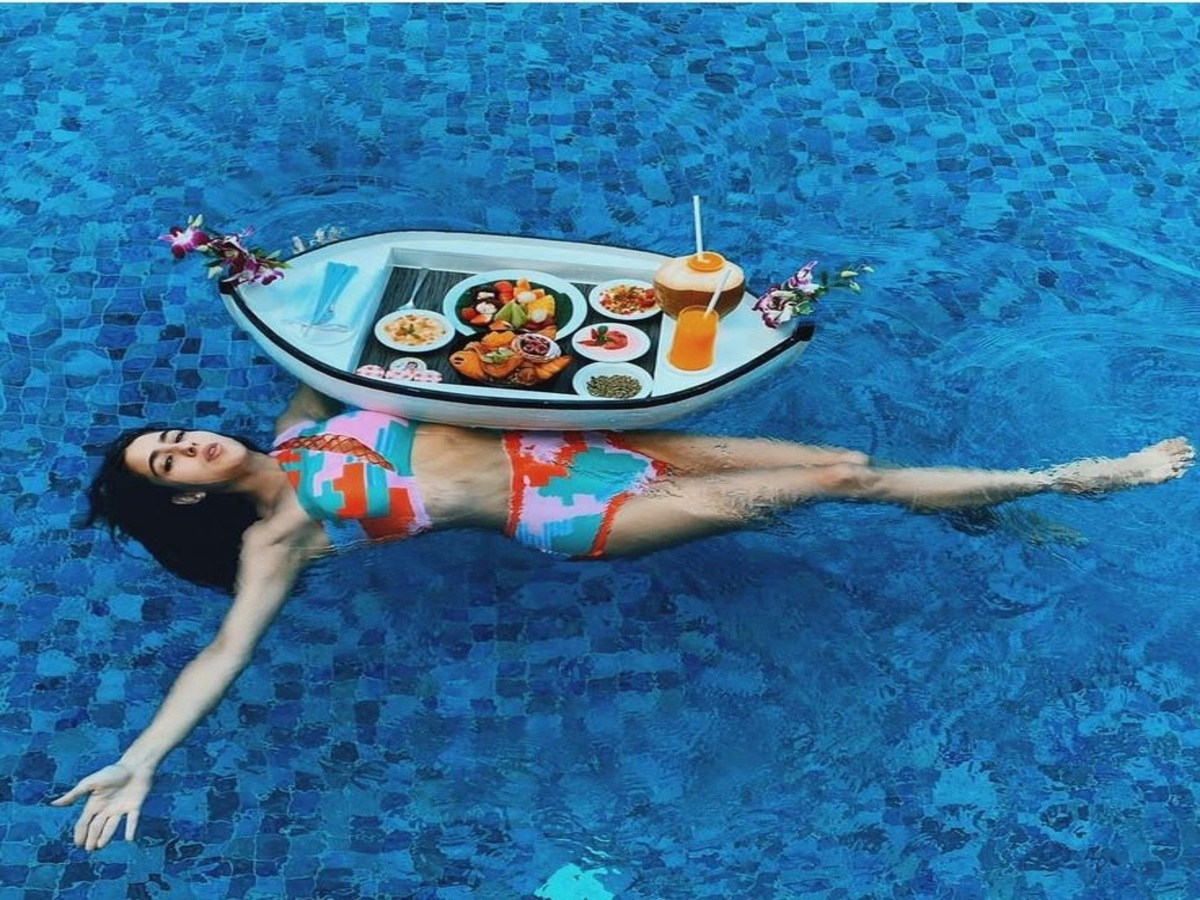 Sara Ali Khan’s Stunning Poolside Moments Captivate Fans - Photo Gallery